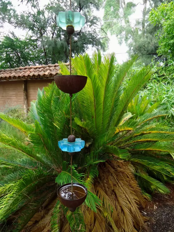 Rain chains, invented in Japan, direct the flow of water from the structure to the landscape.