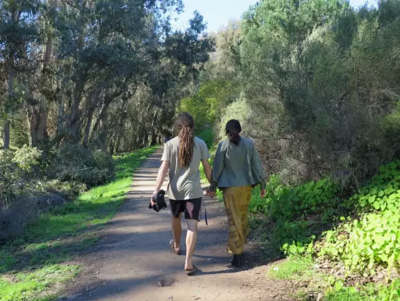 A cute young couple go for a Sunday walk.