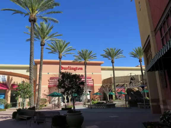 An incredible mall for kids, with imaginative play area, cars to ride, splash pad with synchronized music, sculptures, and outdoor cafes.