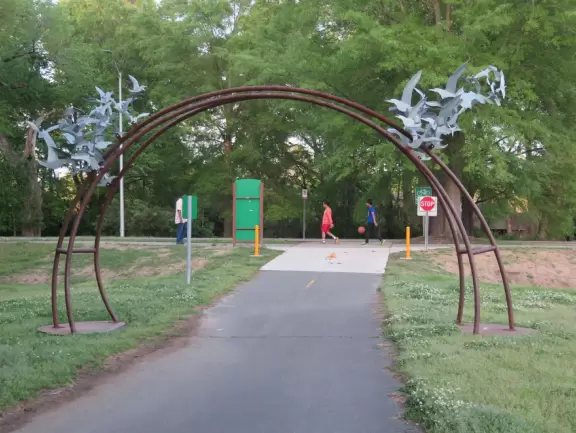 Large shady playground with fun three-person spinner swing. Bolin Creek&nbsp;bike path starts here.