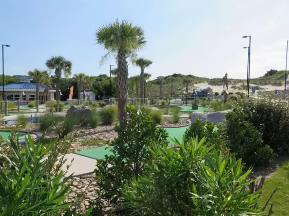 Skate park, small mini-golf, view of dunes, splash pad, and toddler playground. Big kid playground is not good.