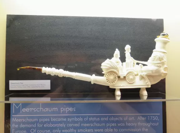 Meerschaum pipe. "Family on carriage ride." Turkey, 1980.