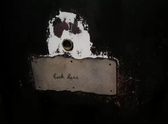 Hole to look through- the children's area is interactive.