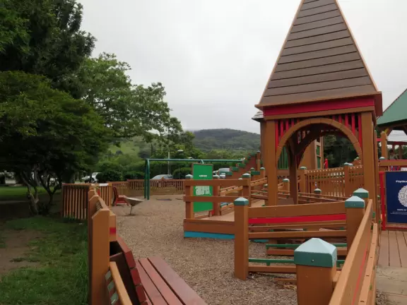 Amazing playground with everything a kid could want, plus gorgeous views of green hills.