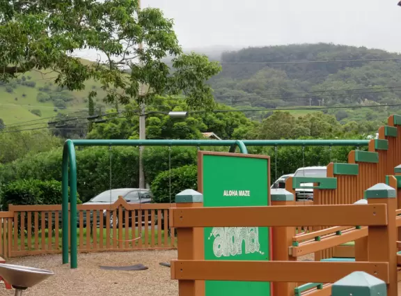 Amazing playground with everything a kid could want, plus gorgeous views of green hills.