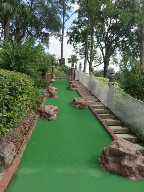Beautiful mini golf with waterfalls, caves, pirate ship, tropical landscaping, and lots of shade.