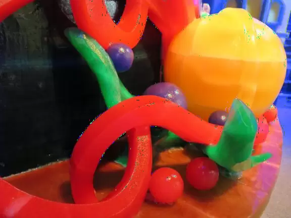 Hotel inside a giant atrium with tropical plants, fish, alligators, and decorations. ICE sculpture event in December.