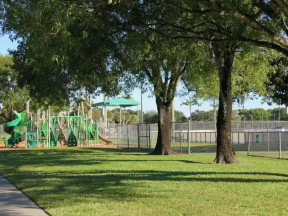 Shady park to walk around. Cute nesting owls! Playground, workout stations, walkway by lake.