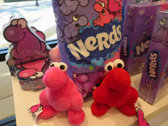 Outdoor mall with movie theater, cafes with atmosphere, candy shop, and more.