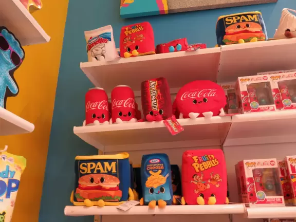 Outdoor mall with movie theater, cafes with atmosphere, candy shop, and more.