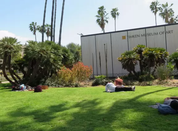 Relaxing on the grass outside Timken Museum of Art.
