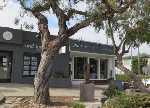 Rusty Surf Shop, at the top of the hill. 