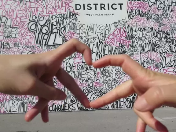 Love Conquers Wall behind Grandview Market. It is great for selfies!