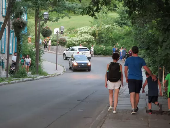 A family makes their way up to the Citadelle, which is on a side street off Rue Saint Louis.