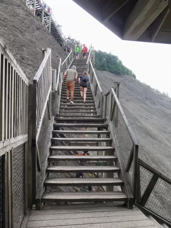 Tall waterfall at the mouth of the Montmorency River. You can walk stairs up to a suspension bridge over the falls.
