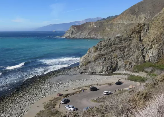 Breathtaking stops along the way, of vertical cliffs and sparkling blue-green water, a lighthouse (reserve online), redwood gulches, swimming holes, stunning beaches, and New Camaldoli Monastery.