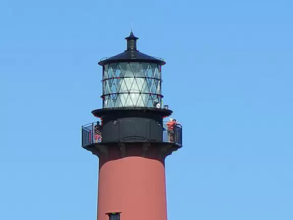 People atop the lighthouse. 