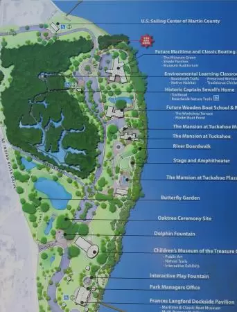 Popular 1.7 mile loop walking path with some shade and wooden boardwalk beside the river.