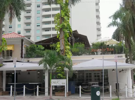 Outdoor mall in downtown Miami's city streets, with colorful decorations.