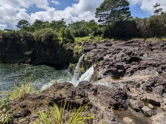 Wai'ale (Waiale) Falls is a difficult, short hike in gorgeous rainforest, to a waterfall. Those who stay behind can see the waterfall anyway, from the highway bridge!