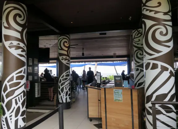 A long beach with clear water like gelatin, backed by older resorts with lovely grounds and a 2.7 mile beachfront path!