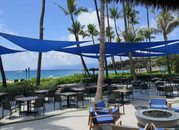 A long beach with clear water like gelatin, backed by older resorts with lovely grounds and a 2.7 mile beachfront path!