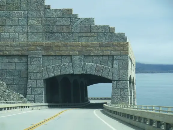 Beach that is like a dream! Crystal clear river leading to the ocean and huge white rocks.