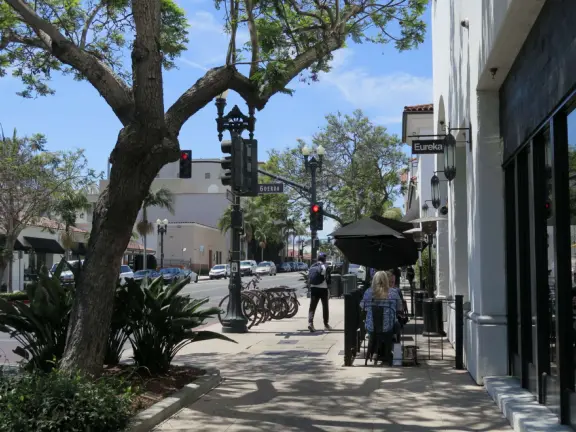 A pedestrian-only area on State Street with sidewalk cafes, good shopping, and colorful Spanish architecture.