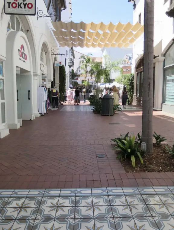 A pedestrian-only area on State Street with sidewalk cafes, good shopping, and colorful Spanish architecture.