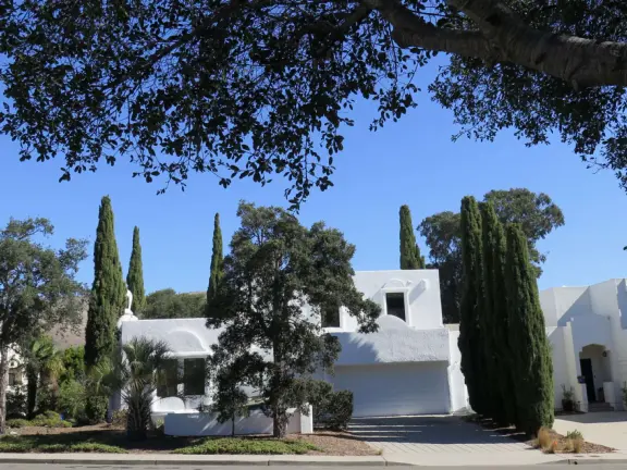 Hilltop park with basketball court with views, picnic tables, eucalyptus trees, and a difficult two-mile out-and-back trail.