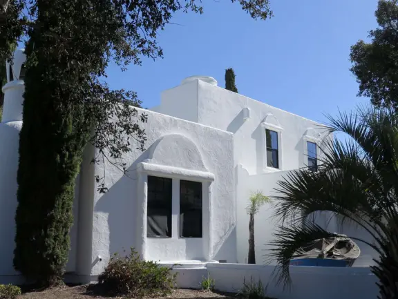 Hilltop park with basketball court with views, picnic tables, eucalyptus trees, and a difficult two-mile out-and-back trail.