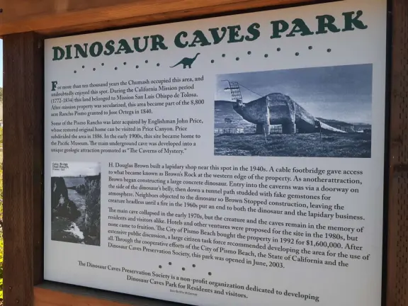 Imaginative playground with dinosaur eggs, huge green lawn, high hills in the distance, and path along the cliffs with views of the ocean and bird rocks!