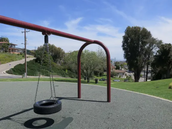 A lovely park in Pismo Heights with playground, sloped lawn with picnic areas, and best of all- rocky lookout with spectacular views of the coastline.