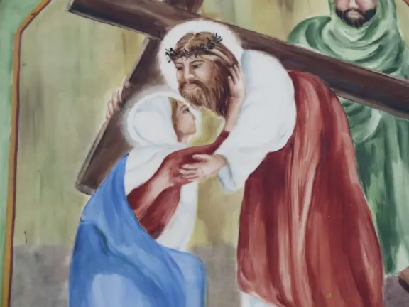 Jesus meets his mother. 