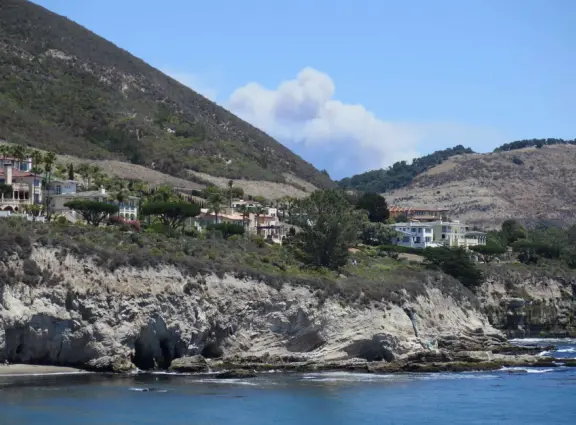 Warm, sheltered cove below Smuggler's Cave. Steep climb down.