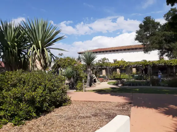 A main street of late 19th century storefronts, popular cafes, and a hip college scene. Recently, suffering an epidemic of homelessness relating to mental health problems.