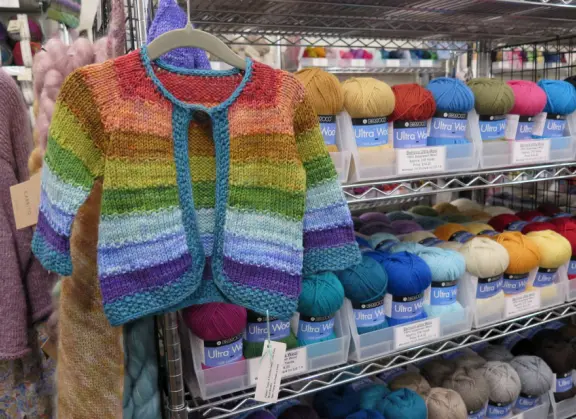 Sample cardigan to knit at Ball and Skein. 