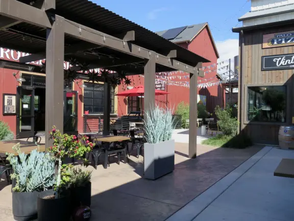 Coffee shop, food court, ice cream and pastry shops, brewery, gift shop and market, outdoor public spaces with fire pit and tables and selfie spots galore, farm with donkeys, goats, and alpaca! Also called San Luis Ranch.