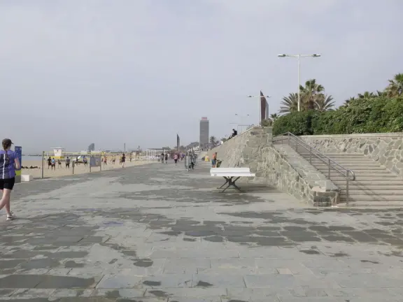 The beach boardwalk with stairs going up to the second level!
