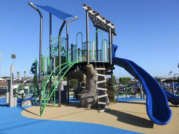 City park with amphitheatre, huge lawn, and incredible playground for kids! Fantastic free summer concerts!