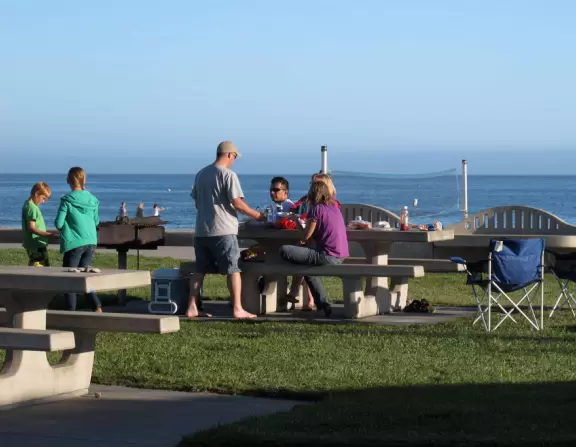 Picnic tables by the playground.
