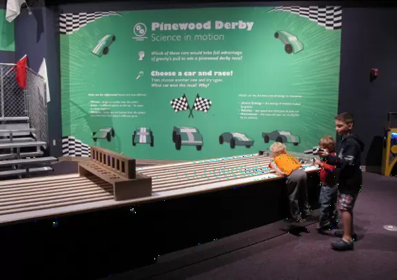 Little boys could play all day at this Pinewood Derby exhibit!