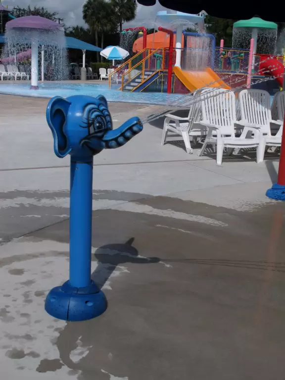 Fun splash playground and splash pad with plenty of shaded chairs for parents.