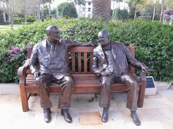 A tropical wonderland of palms, ferns, bromeliads, fountains, sculptures, rocks, ironwork gates, and pergolas, with the delightful scent of flowers filling the air.